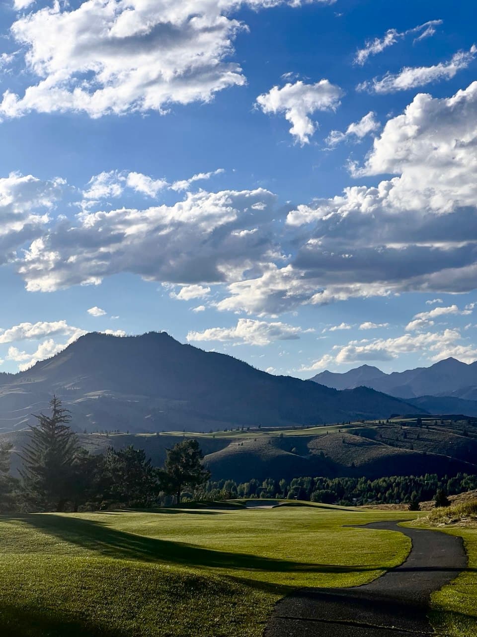 Mountain valley golf course at golden hour